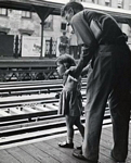 Girl and man on el platform