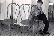 boy, 3 chairs
